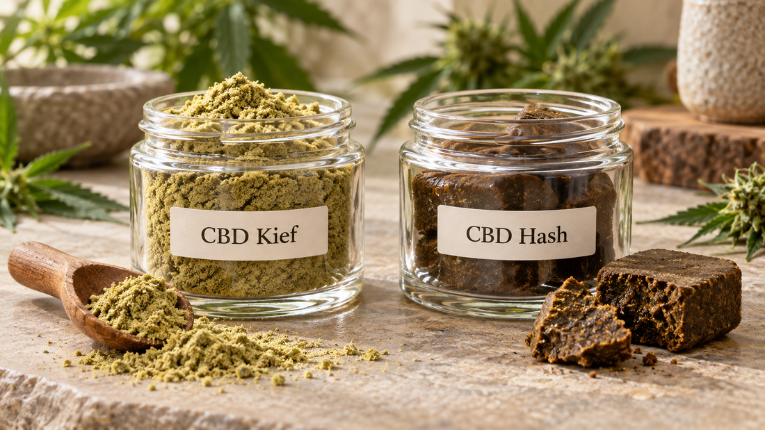 CBD kief and CBD hash displayed side by side in labelled glass jars, showing the difference between loose golden kief powder and dense pressed hash.